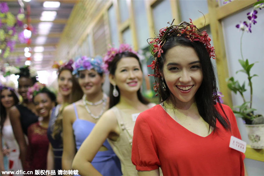 Miss World contestants at Sanya orchid show