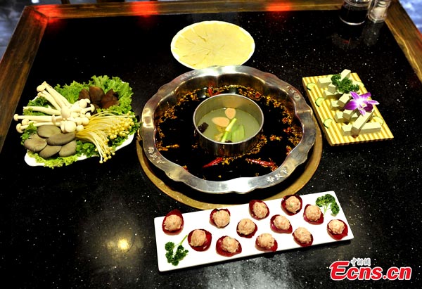 Hotpot restaurant gains popularity for Cameron's visit