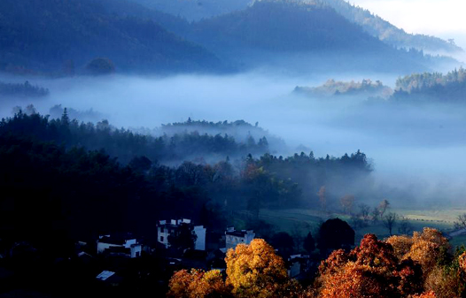 Fog-covered countryside residences in Huangshan