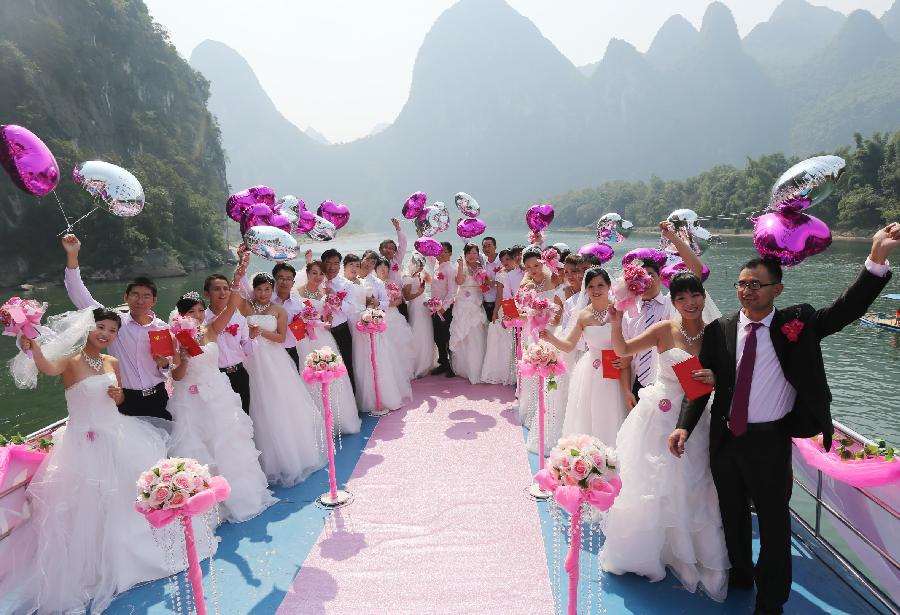 New couples take wedding photos during holiday