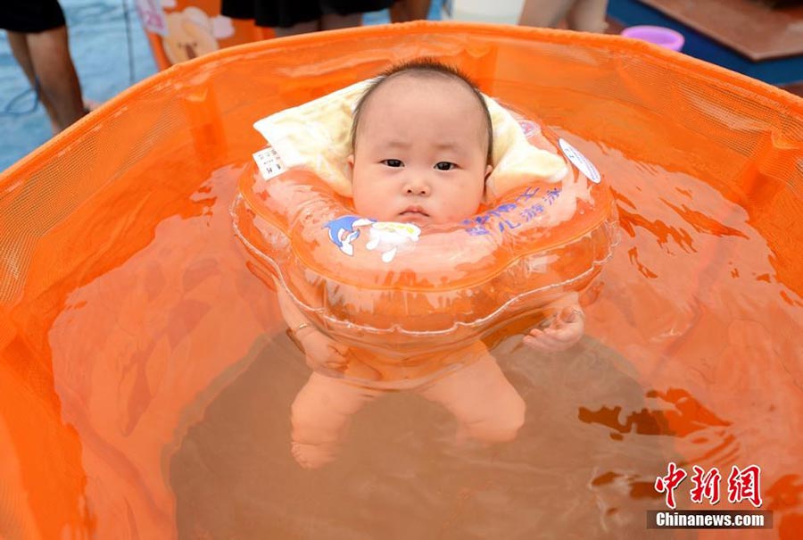 Babies in swimming contest