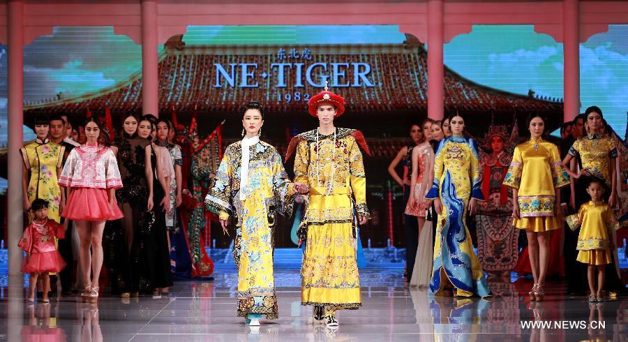 Qipaos sizzle on the runway as China Fashion Week kicks off