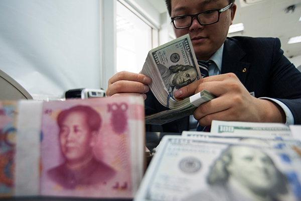 Strong fundamentals lift yuan