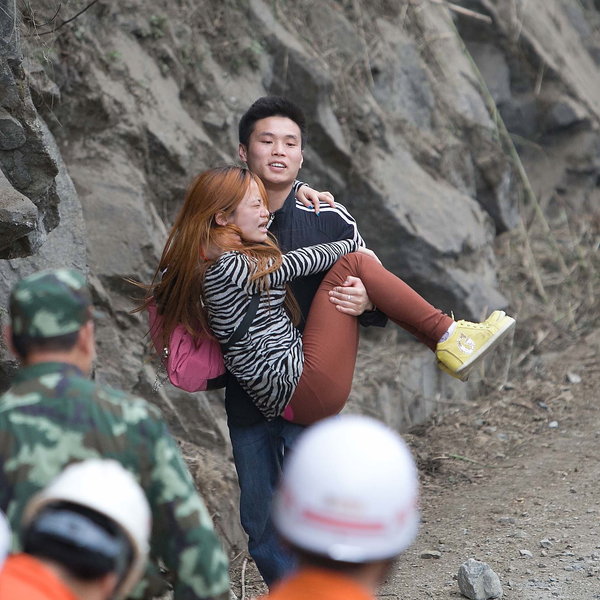 Photos: Man helps friend out of danger