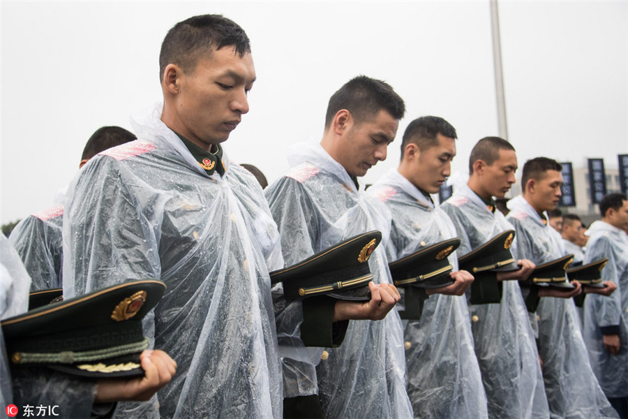 Thousands pay tribute to victims of Nanjing Massacre