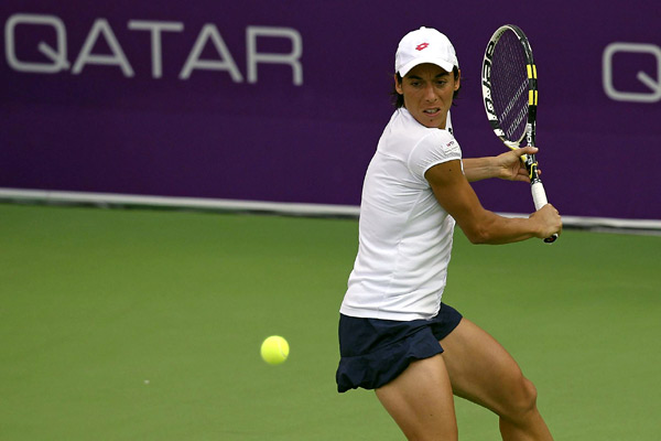 Li Na knocked out, Peng Shuai through to Qatar quarters