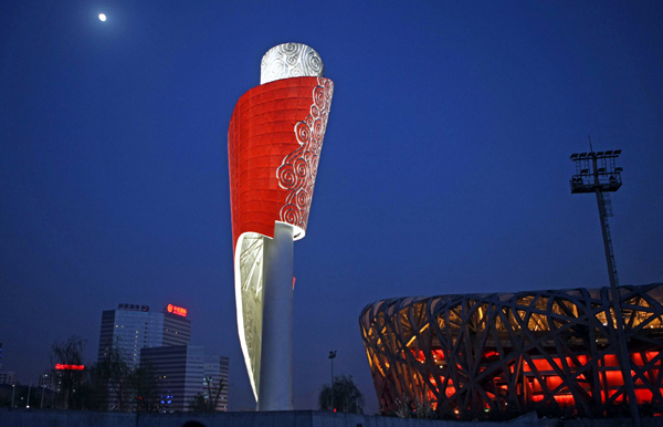 Olympic torch lights up Bird's Nest once again