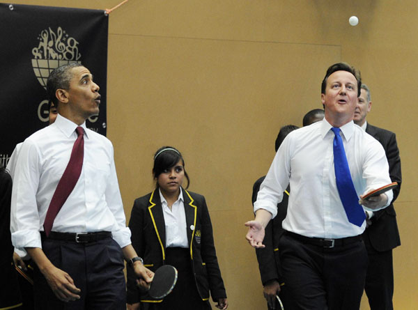 Obama, Cameron team up as table tennis partners