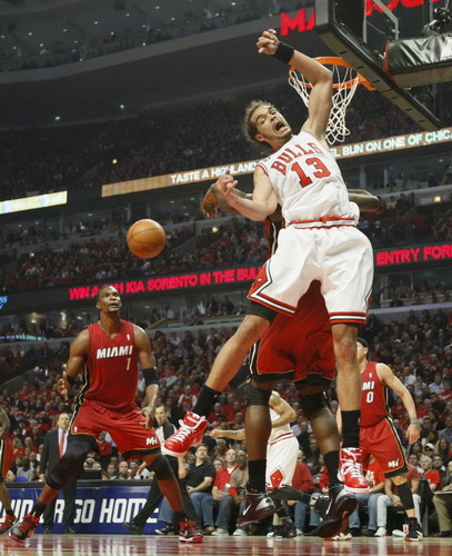 James, Wade lead charge as Heat eliminate Bulls