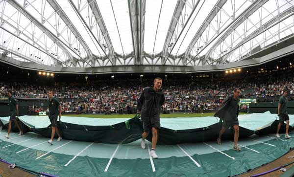 Rain soaks opening day at Wimbledon