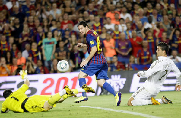 Messi fires Barca to dramatic Super Cup win