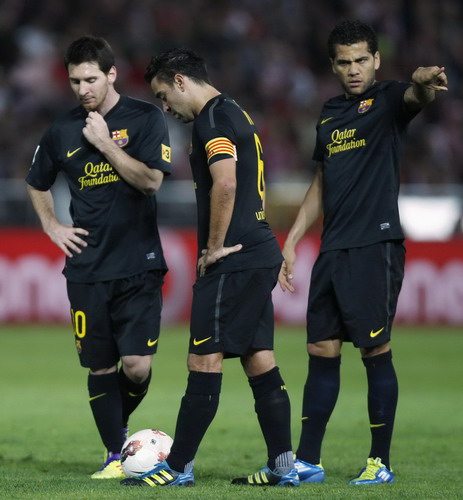 Xavi lifts listless Barca to win at Granada