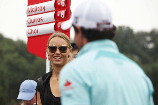 World No 1 Wozniacki roots for golfer boyfriend