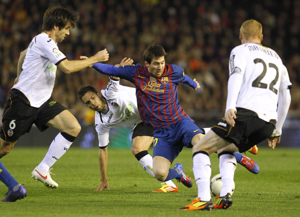 Messi thwarted as Valencia hold Barca in Cup