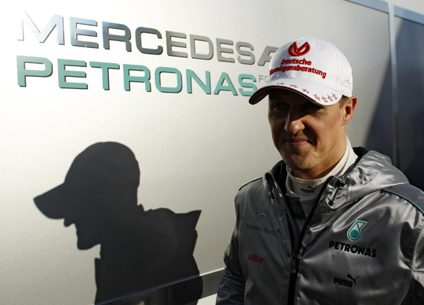 Schumacher plays down title chances