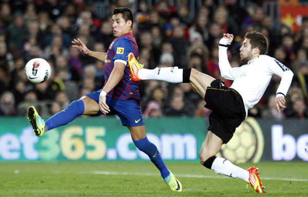 Messi scores four as Barca thrash Valencia