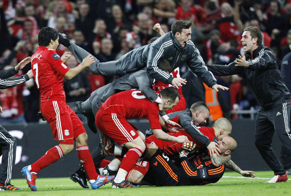 Liverpool survive Cardiff scare to win League Cup