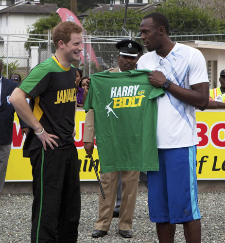 Prince Harry runs with Usain Bolt in Jamaica