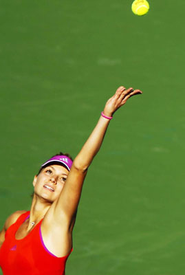 Ivanovic and Sharapova advance into last four