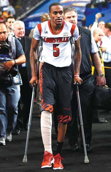 Ware watches Cardinals' Final Four victory from the bench