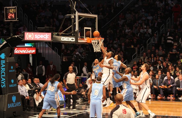 Nets knocked down by Nuggets, home boos