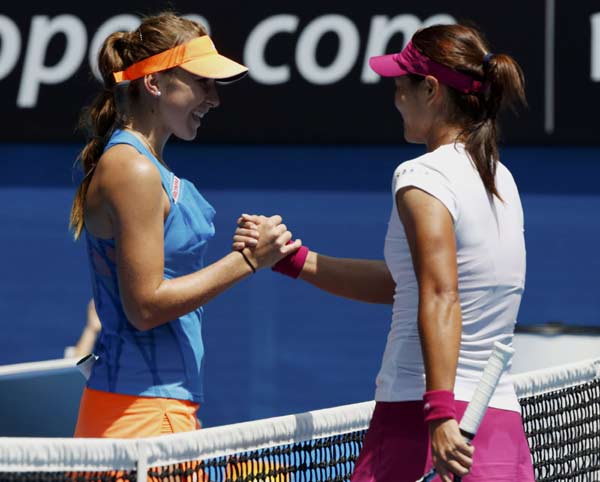 Li Na overcomes tiebreak to make into third round