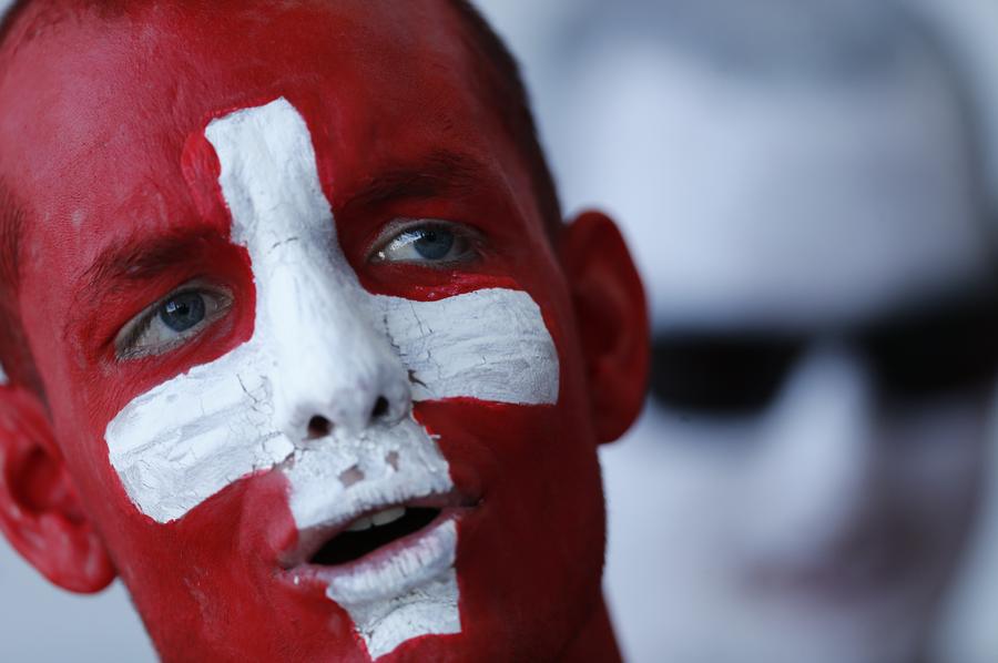 National flags on fan's face