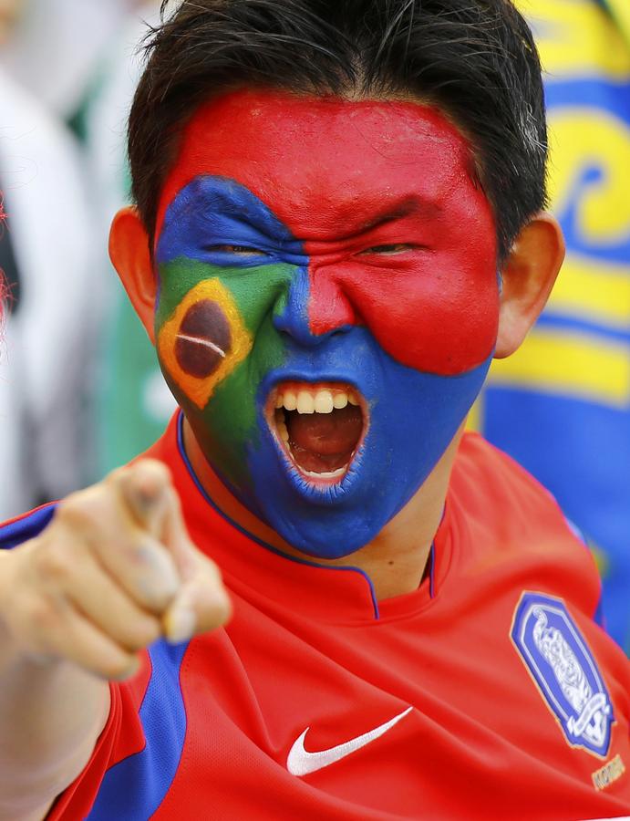 National flags on fan's face