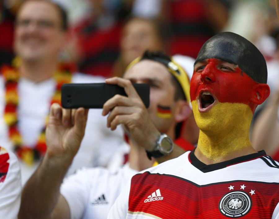 National flags on fan's face