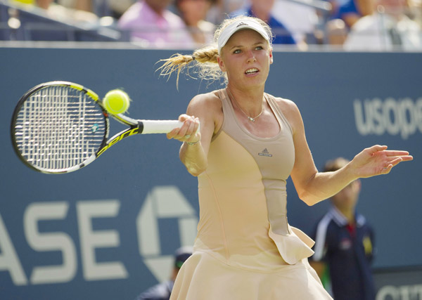 Wozniacki reaches US open final as injured Peng quits