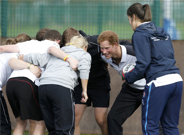 Prince Harry gets in game on the rugby pitch