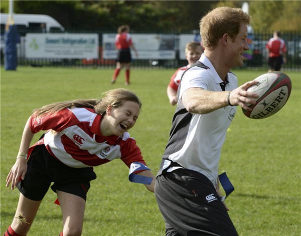 Prince Harry gets in game on the rugby pitch