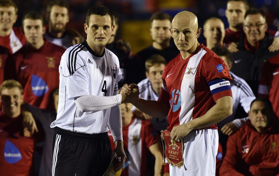 British, German soldiers play Christmas truce centenary match