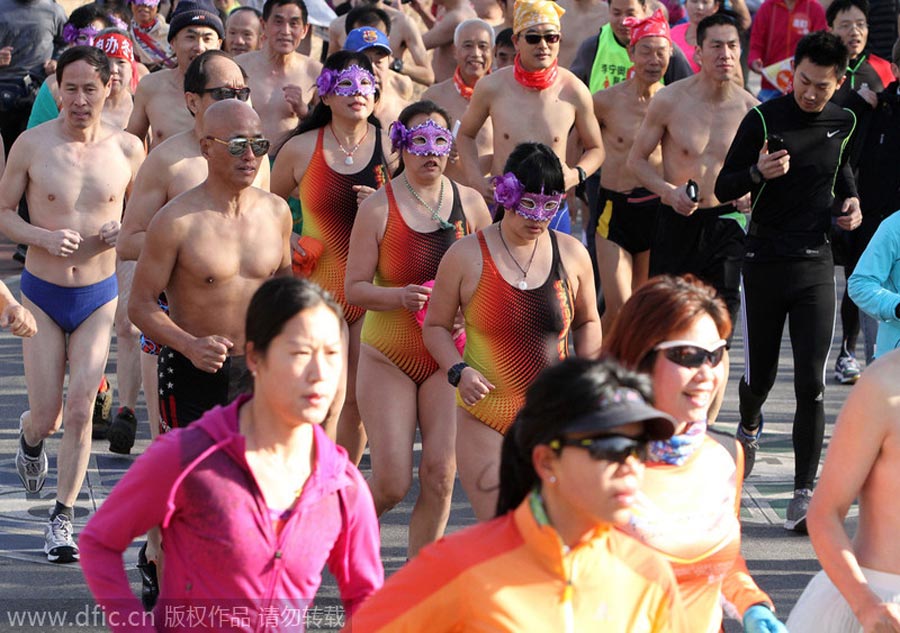 Monkey king, angel and superwoman at Beijing's 'naked run' race