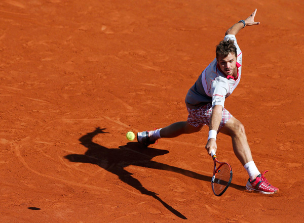 Inspired Wawrinka tames Djokovic to win French Open