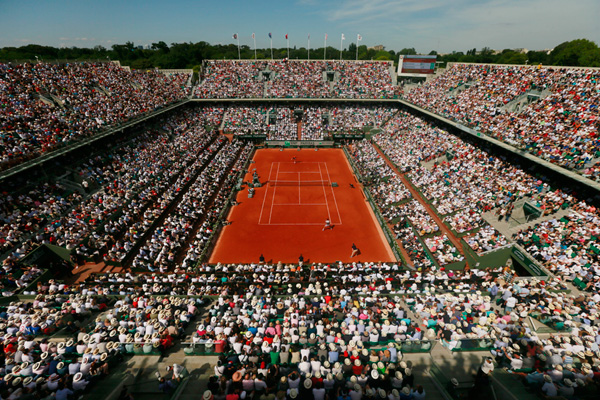 Inspired Wawrinka tames Djokovic to win French Open