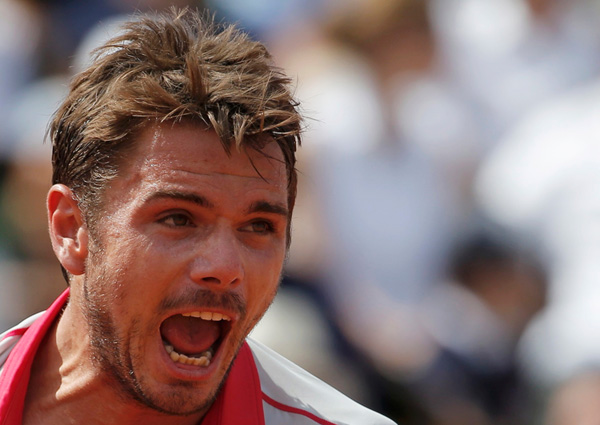 Inspired Wawrinka tames Djokovic to win French Open