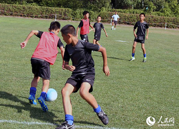 German training style vs. youth football players from China