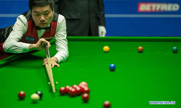 China's Ding edges Gould to reach last 16 at snooker worlds