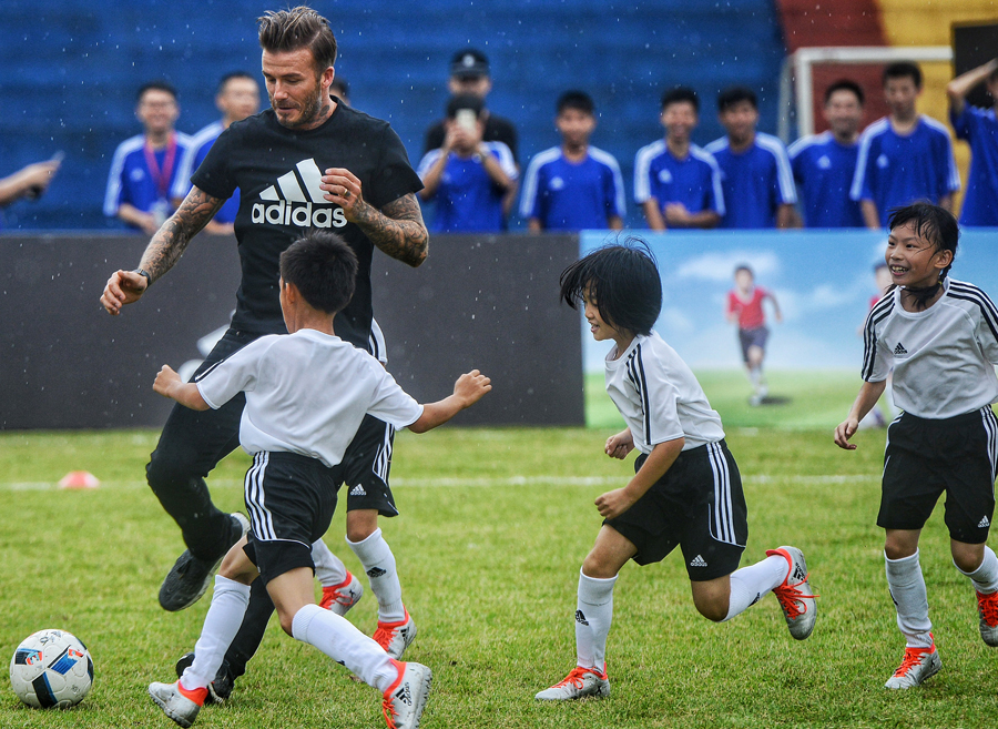 David Beckham promotes football in South China school