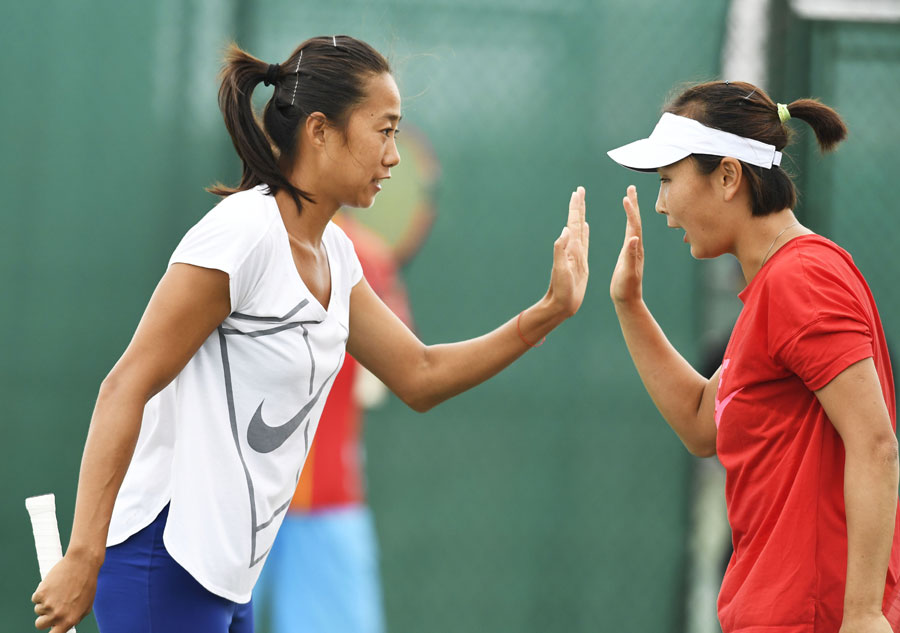 Chinese athletes attend training session of tennis in Rio