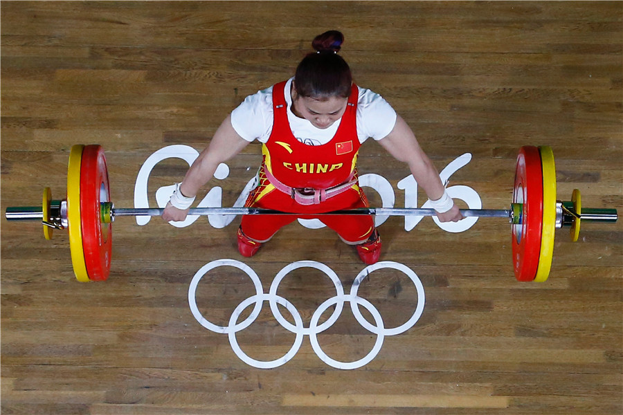 Weightlifter Deng Wei breaks world records