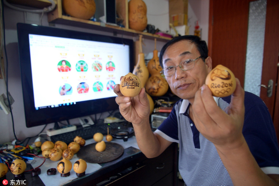 Pyrographs of China's Rio Olympics champions on gourds