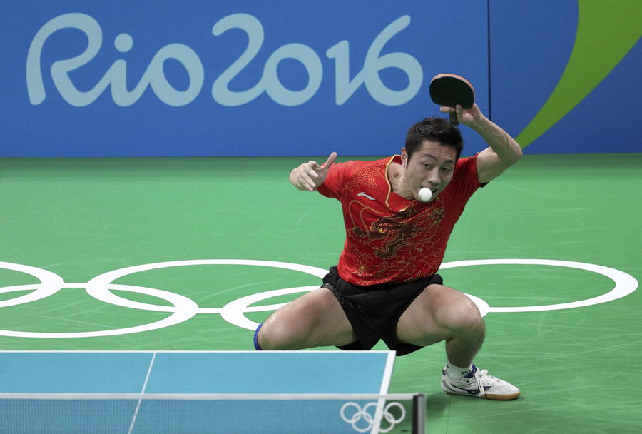 Chinese men's table tennis overcomes singles loss to win team event