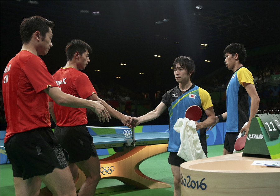 Chinese men's table tennis overcomes singles loss to win team event