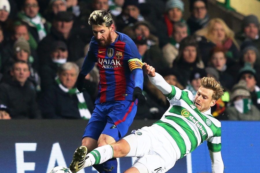 Messi double guides Barcelona to 2-0 win at Celtic