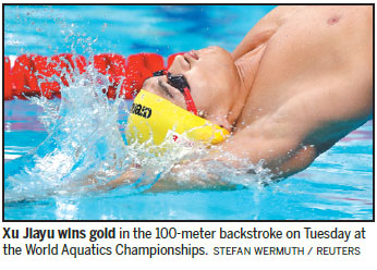 Tough overseas training pays off for golden swimmers