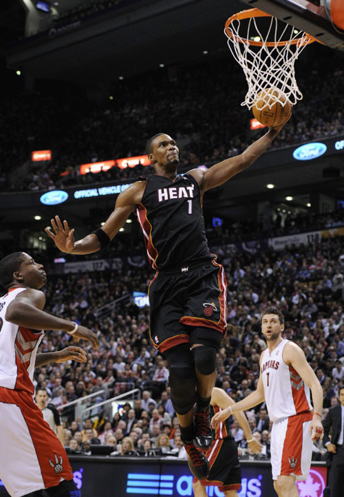 Bosh help Miami win