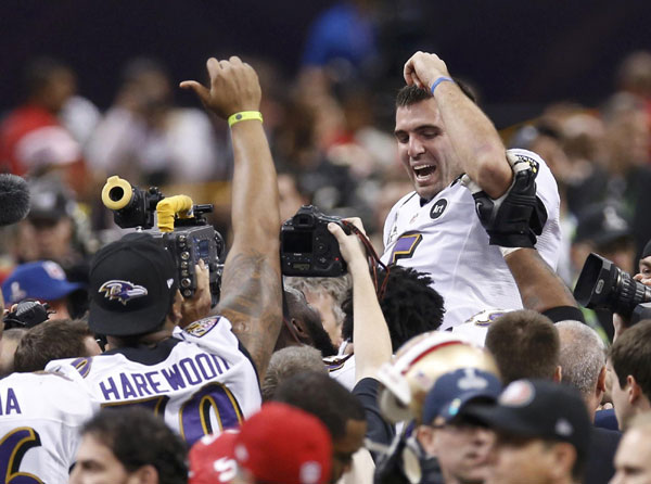 Ravens survive 49ers rally, power outage to win Super Bowl