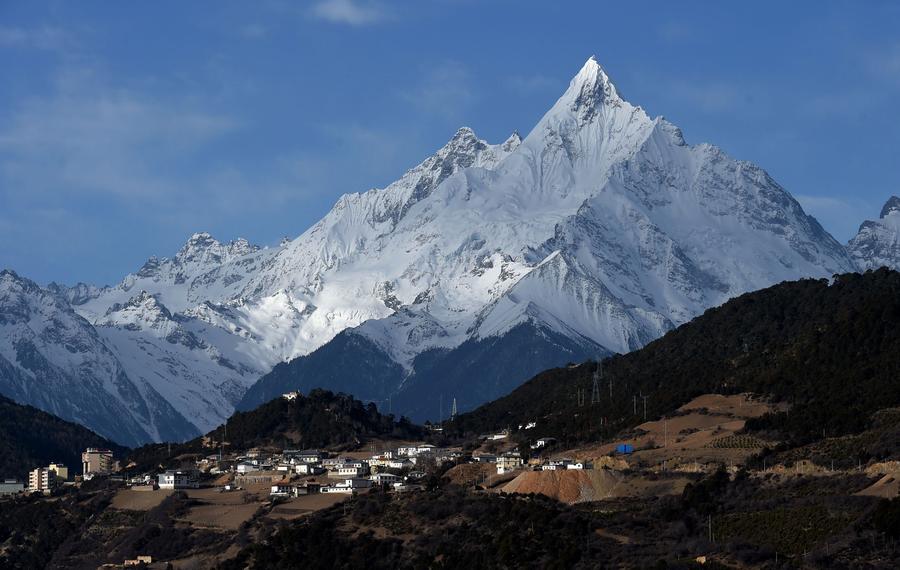 Magnificent Diqing snow-capped mountain in early spring